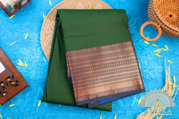 Dark Green Semi Silk Kanchipuram Saree with a Shimmering Blue Pallu