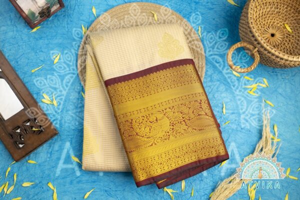 Timeless Half White Semi Kanchipuram Saree with Bold Maroon Annam Border