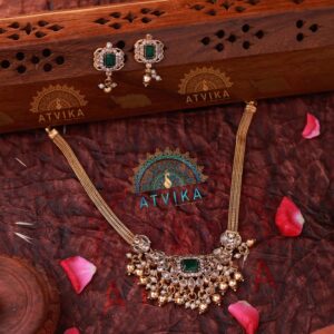 Exquisite Kundan Choker with Green Stone Centerpiece and Dangling Accents