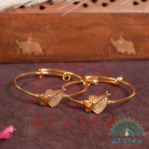 Adjustable Gold-Toned Heart Charm Bangle Bracelet with Stone Detailing