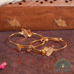 Adjustable Gold-Toned Heart Charm Bangle Bracelet with Stone Detailing- Back