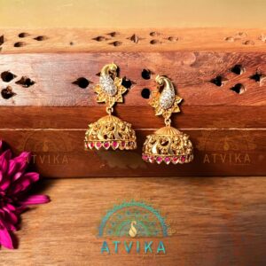 Peacock Grace Antique Gold Jhumka Earrings with Ruby Detailing